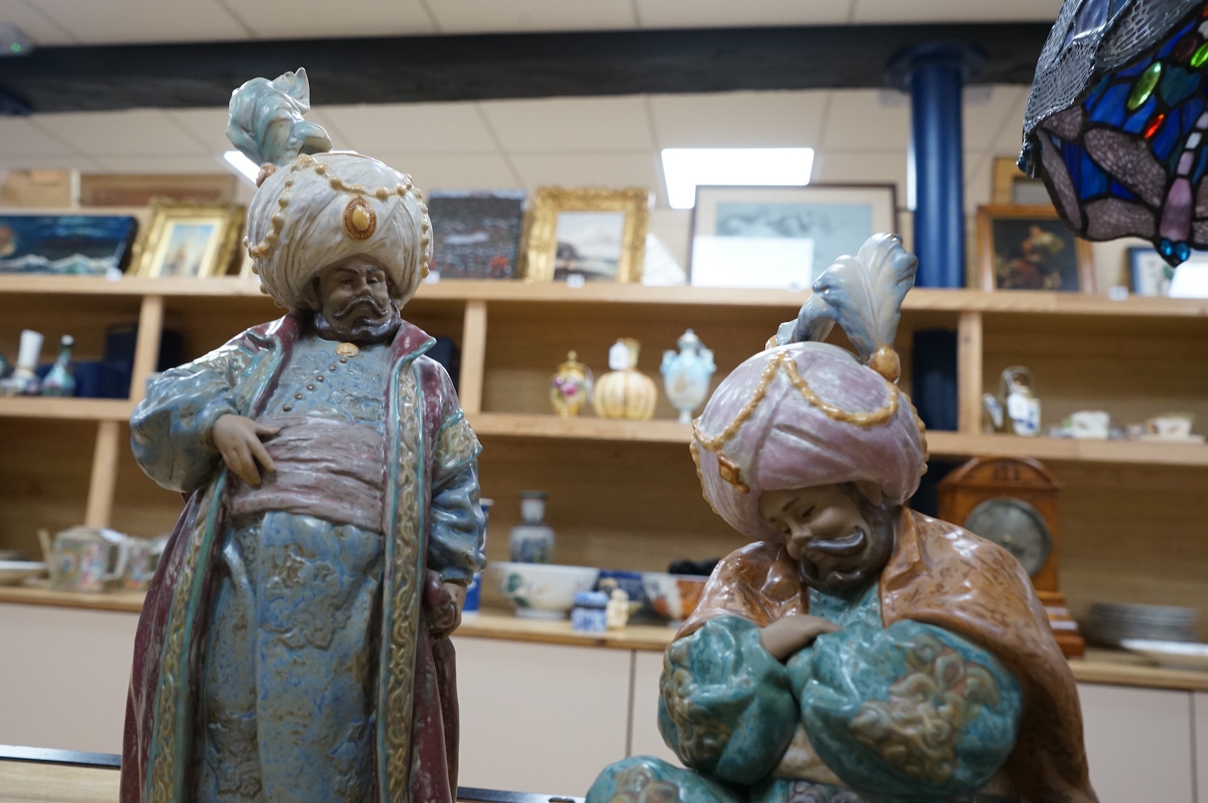 Two Lladro polychrome stoneware figures of ‘Sultans’.(2) tallest 40cm.
